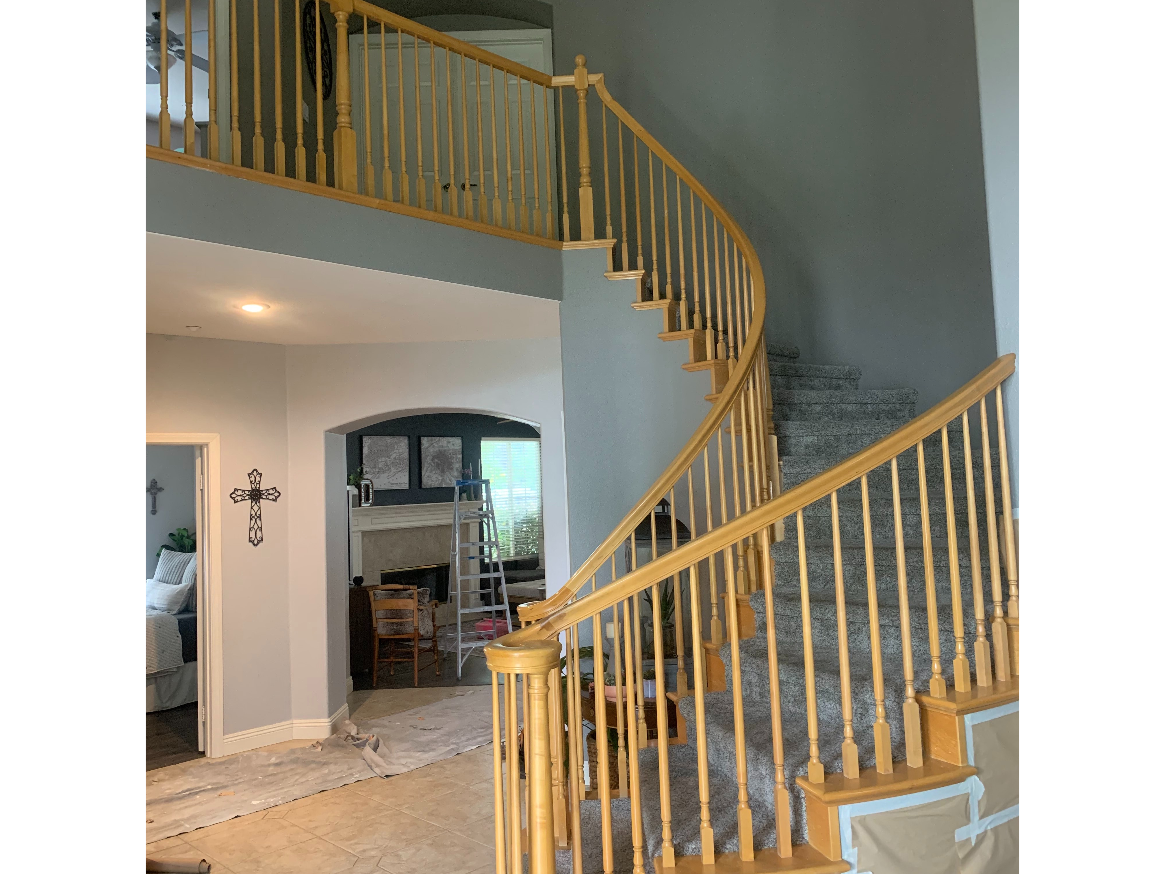 A Cozy Home Staircase With a Clean White Wall