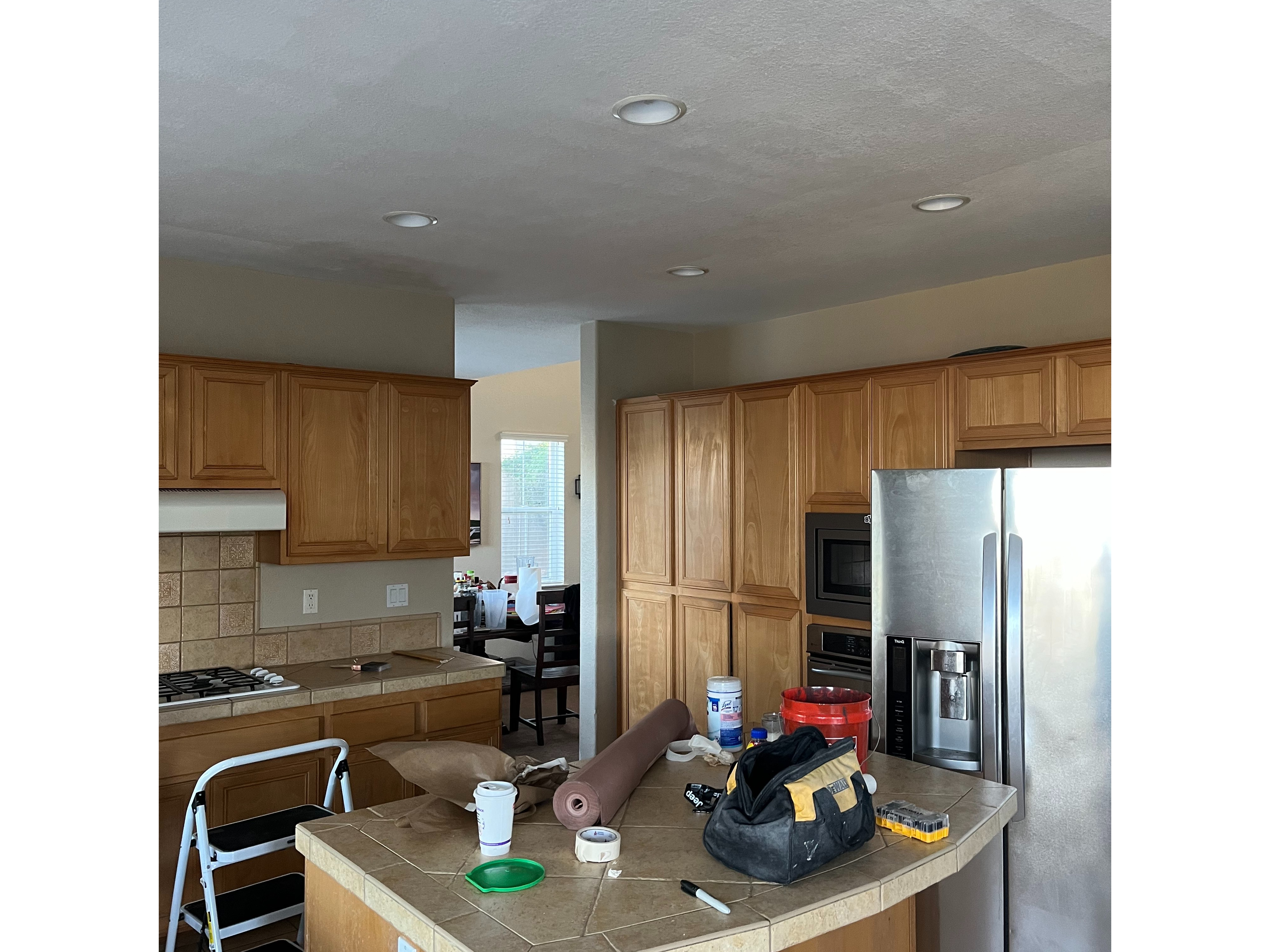 A Bright Kitchen Featuring a Clean Counter and a Shiny Sink
