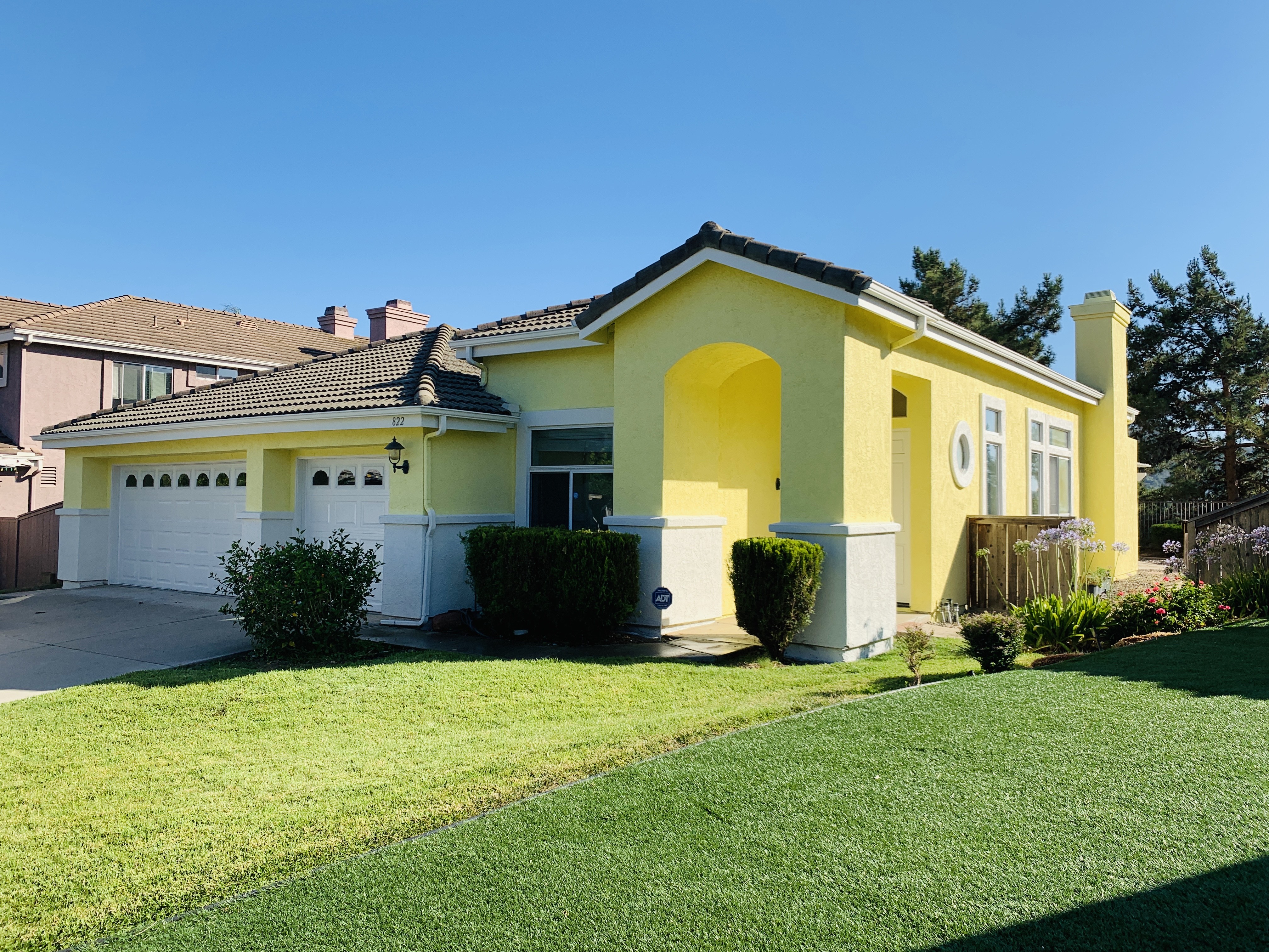 Yellow Home With Clean Sorroundings