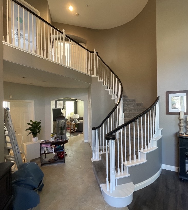 A Cozy Home Staircase With a Clean White Wall 2